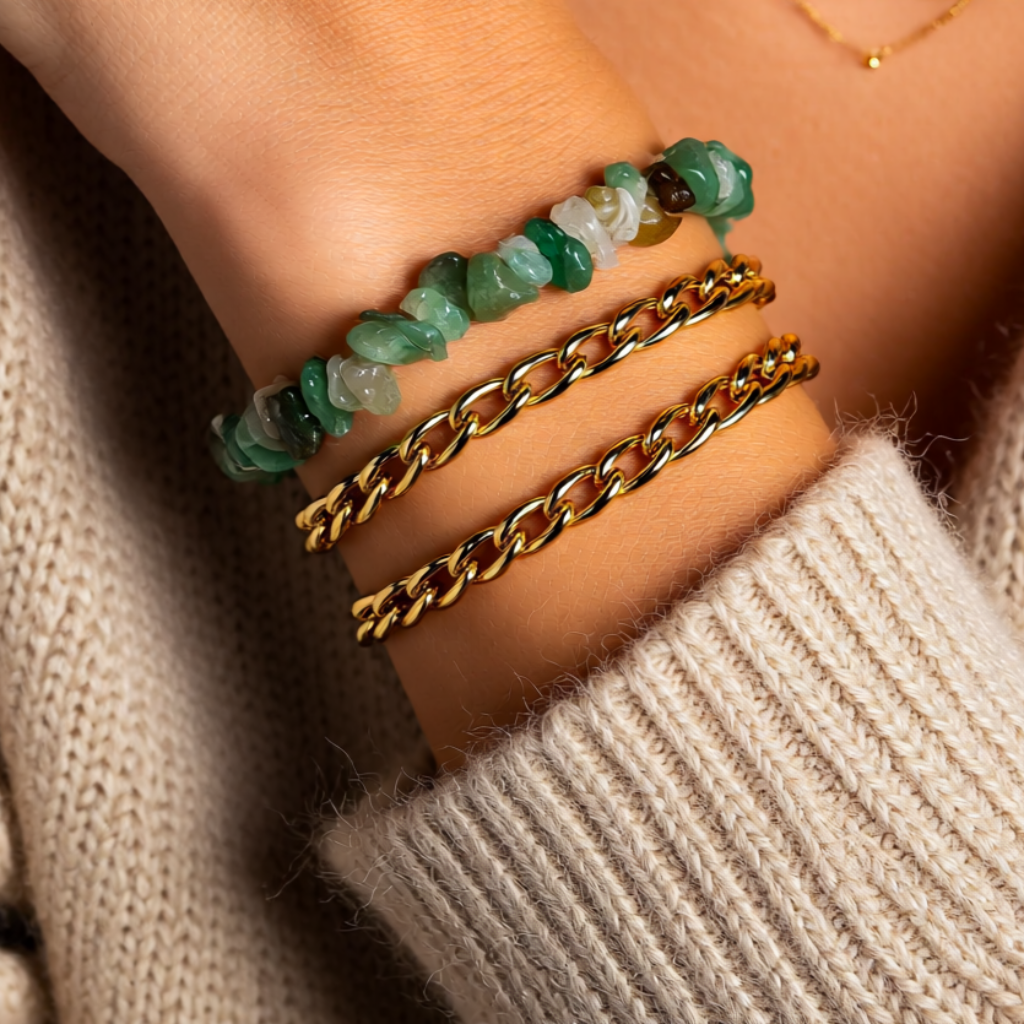 Three bracelets on a wrist 