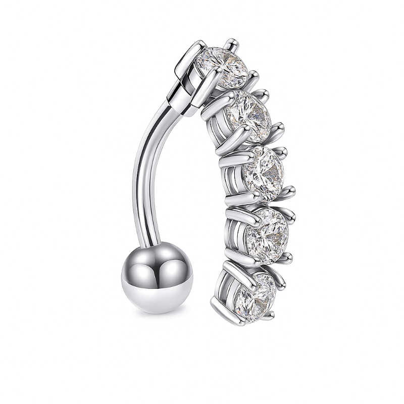Silver belly button ring with clear gemstones on a white background